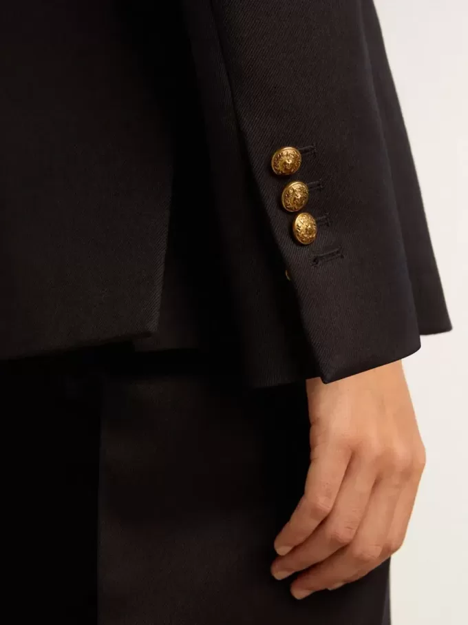 Donkerblauwe blazer met dubbele knoopsluiting voor dames