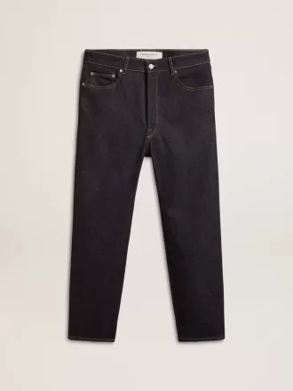 Donkerblauwe herenjeans van één keer gewassen denim