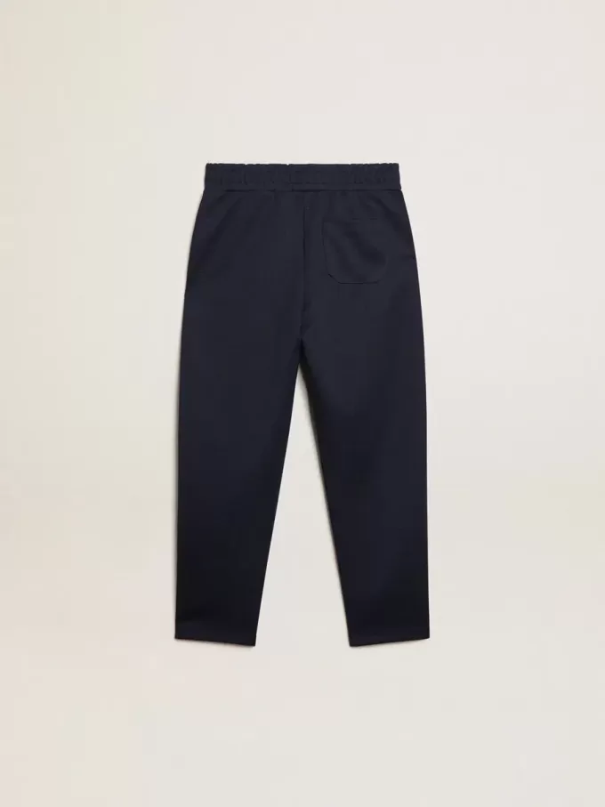 Donkerblauwe joggingbroek met witte streep en contrasterende sterren