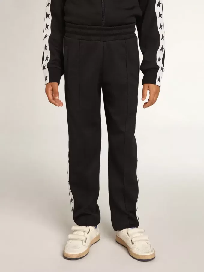 Donkerblauwe joggingbroek met witte streep en contrasterende sterren