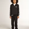 Donkerblauwe joggingbroek met witte streep en contrasterende sterren