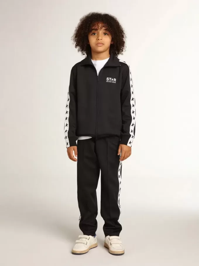 Donkerblauwe joggingbroek met witte streep en contrasterende sterren