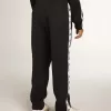 Donkerblauwe joggingbroek met witte streep en contrasterende sterren