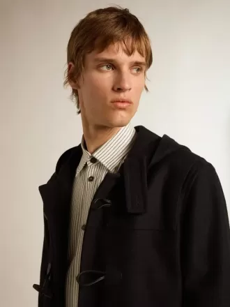 Donkerblauwe wollen duffelcoat met capuchon en knopen