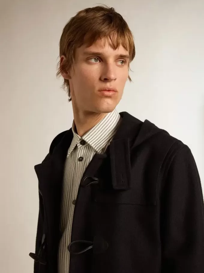 Donkerblauwe wollen duffelcoat met capuchon en knopen