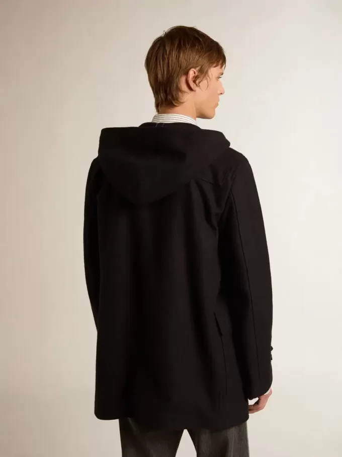 Donkerblauwe wollen duffelcoat met capuchon en knopen