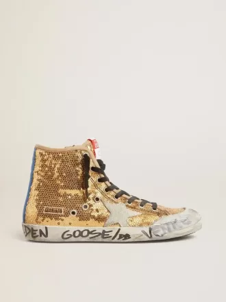 Francy Penstar in gouden pailletten met suède ster en felblauwe hielband