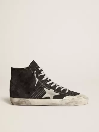 Francy Penstar in zwart canvas met witte suède ster en zwarte suède hiellip.