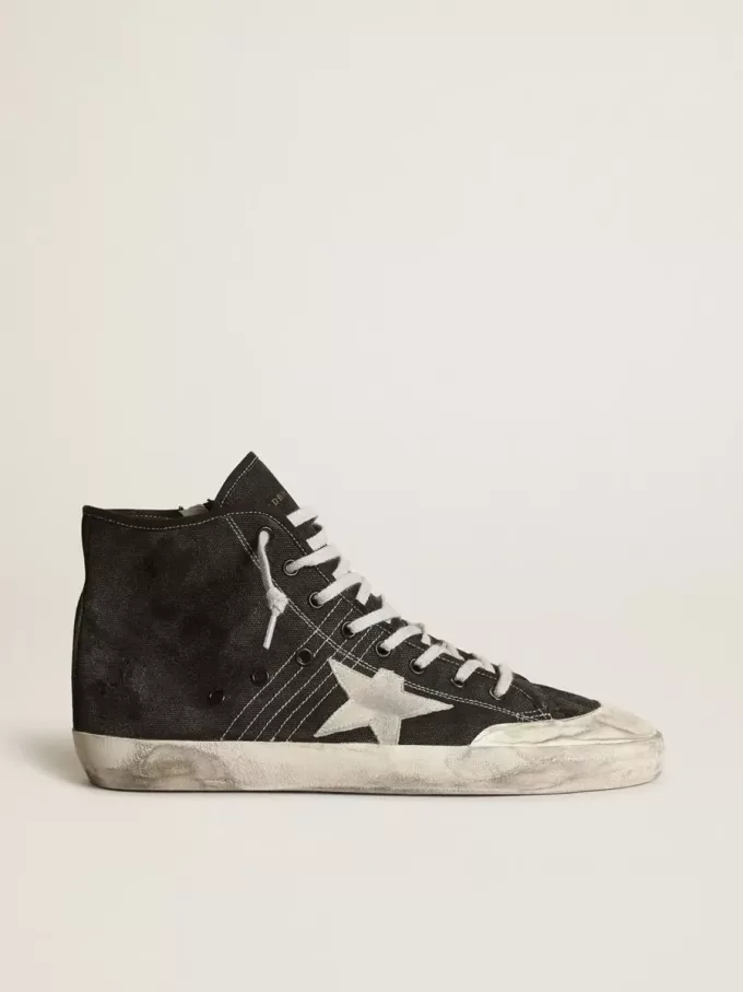 Francy Penstar in zwart canvas met witte suède ster en zwarte suède hiellip.