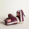 Francy sneakers met pailletten en handgeschreven letters op de buitenzool
