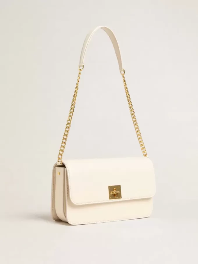Gioia-tas in botergeel leer met gouden details
