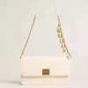 Gioia-tas in botergeel leer met gouden details