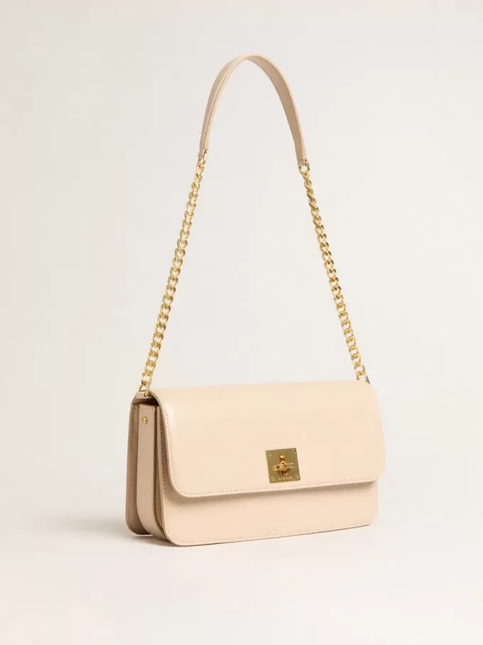 Gioia-tas in lichtroze leer met gouden details