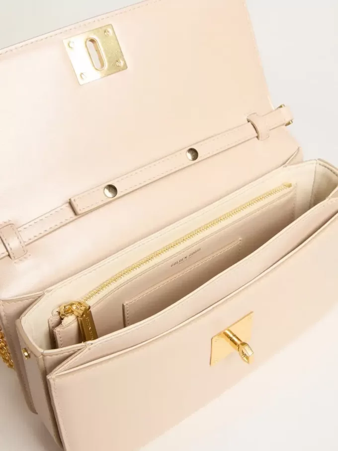 Gioia-tas in lichtroze leer met gouden details