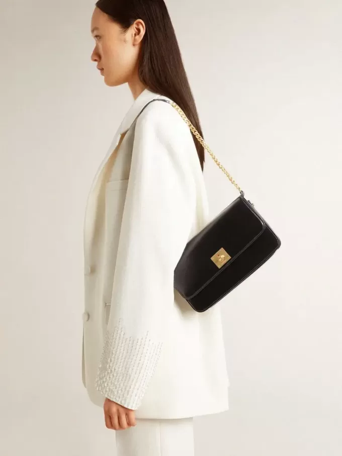 Gioia-tas in zwart leer met gouden details