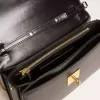 Gioia-tas in zwart leer met gouden details