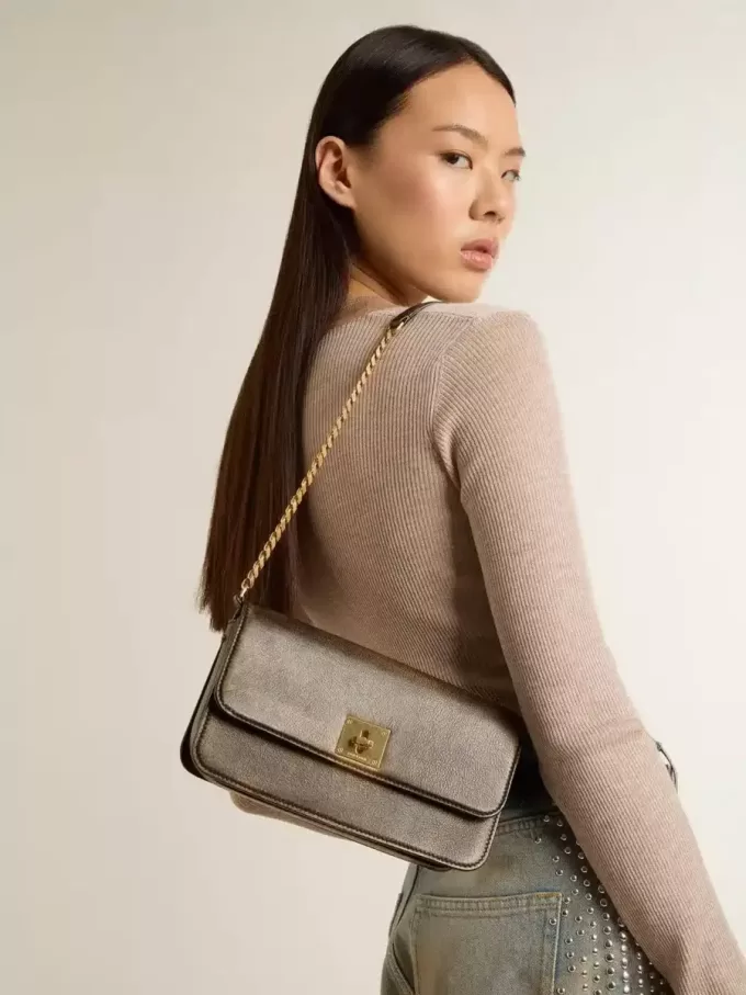 Gioia-tas in zwart vintage leer met gouden details