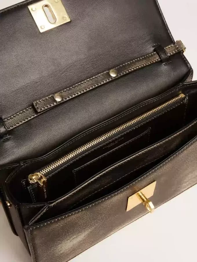Gioia-tas in zwart vintage leer met gouden details
