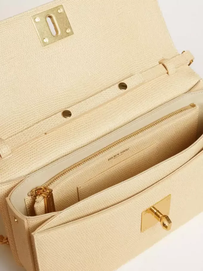 Gioia-tas van vanillekleurig schapenleer met gouden details
