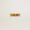 Gouden kanten label in antiek goudkleur met parels