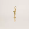 Goudkleurige messing bedel met Golden Goose-signatuur