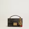 Goudkleurige messing bedel met Golden Goose-signatuur