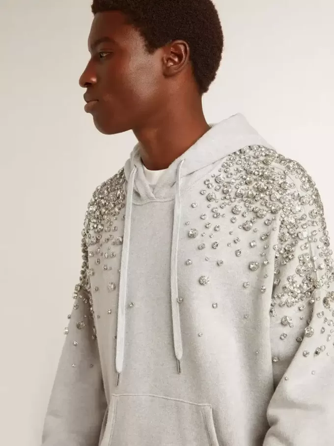 Grijs sweatshirt met capuchon en kristallen versiering