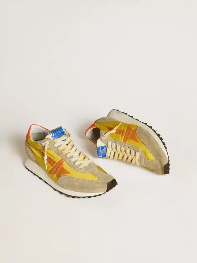 Heren Marathon met geel nylon bovenwerk en oranje ster