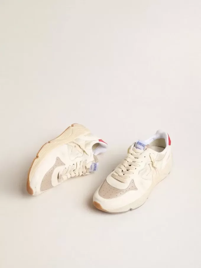 Heren Running Sole van nappaleer met beige leren ster en rode hiellip.