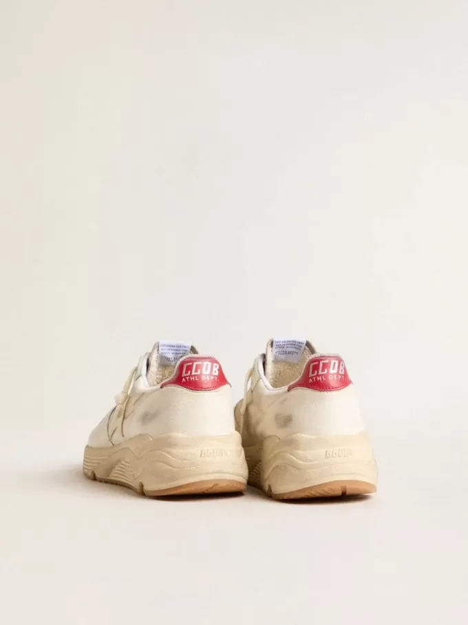 Heren Running Sole van nappaleer met beige leren ster en rode hiellip.