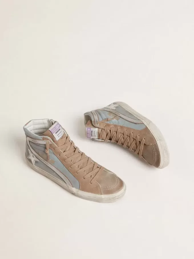 Heren Slide in lichtblauw canvas met zilverkleurige metallic leren details