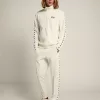Witte joggingbroek voor heren met zwarte sterren aan de zijkanten