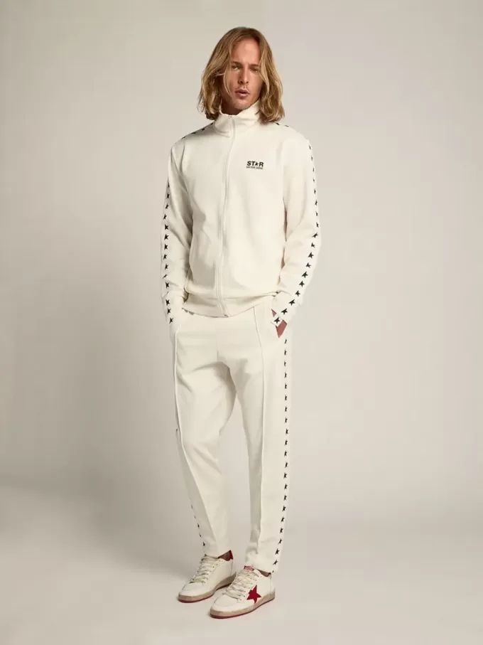 Witte joggingbroek voor heren met zwarte sterren aan de zijkanten