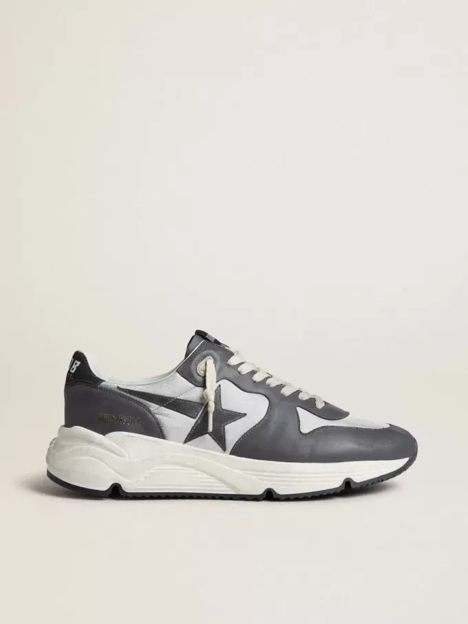 Herenhardloopzool van grijs nylon en zwart nappaleer met een zwarte suède ster