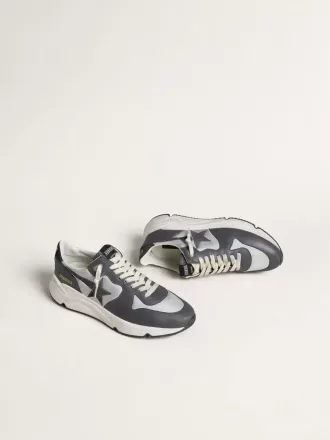 Herenhardloopzool van grijs nylon en zwart nappaleer met een zwarte suède ster