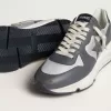 Herenhardloopzool van grijs nylon en zwart nappaleer met een zwarte suède ster
