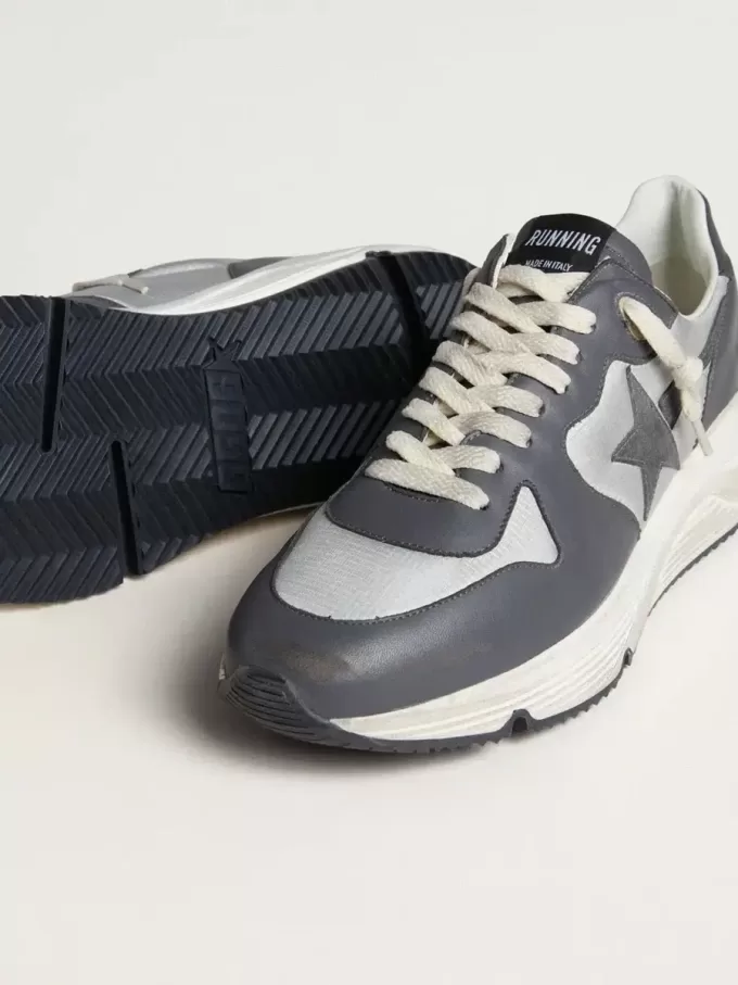Herenhardloopzool van grijs nylon en zwart nappaleer met een zwarte suède ster