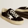 Hi Star in zwart fluweel met witte leren ster en suède hielstuk.