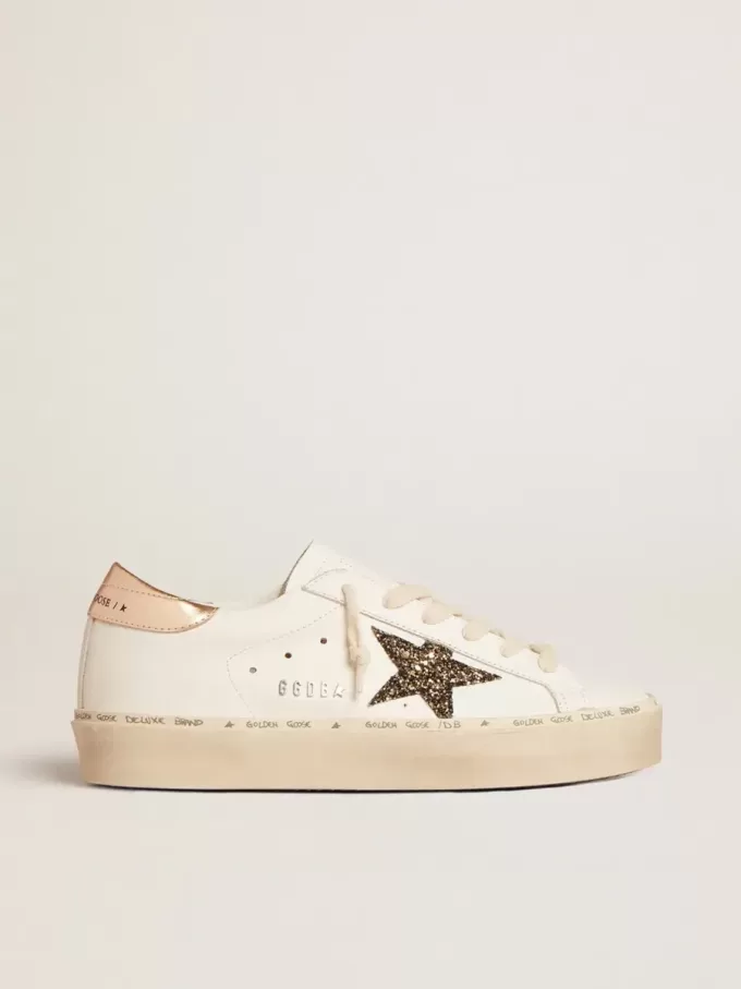 Hi Star LTD met zwarte en gouden glitterster en gouden hiellip