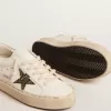 Hi Star LTD met zwarte en gouden glitterster en gouden hiellip