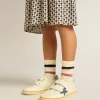 Junior Ball Star met blauwe glitterster en beige suède hielstuk