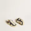 Junior May in wit en blauw leer met leren ster en hielstuk
