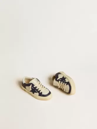 Junior May in wit en blauw leer met leren ster en hielstuk