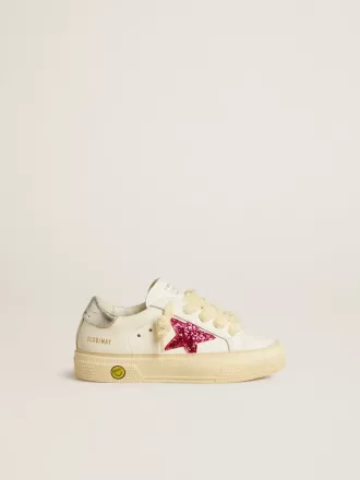 Junior May met fuchsia glitterster en metallic leren hielstuk