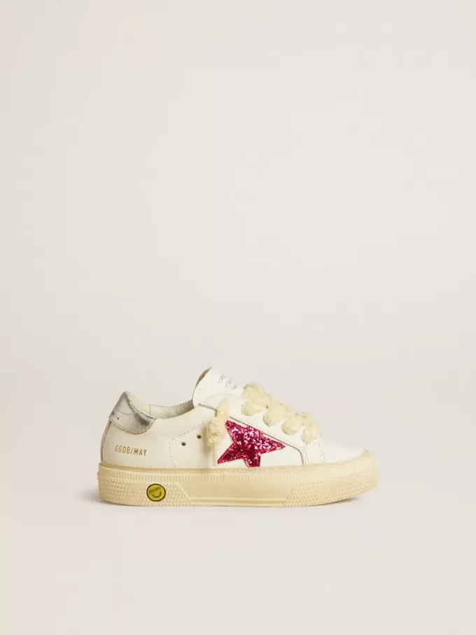 Junior May met fuchsia glitterster en metallic leren hielstuk