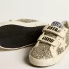 Junior Old School in platina glitter met leren ster en hielstuk