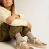 Junior Super-Star in glitter met suède ster en hielstuk