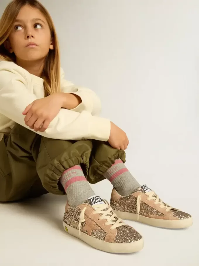 Junior Super-Star in glitter met suède ster en hielstuk