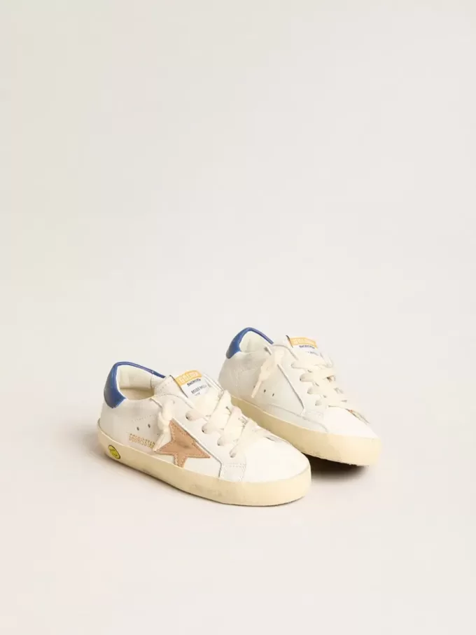 Junior Super-Star van nappaleer met een beige ster en blauwe hiellip.