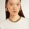 Ketting in antiek goud met aflopende ketting en stervormige sluiting